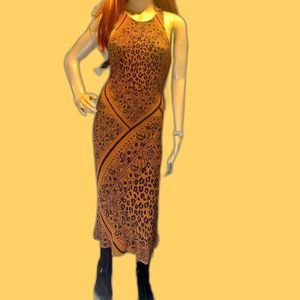 Farm by anthropology maxi dress rust print  form fitting good condition size XS